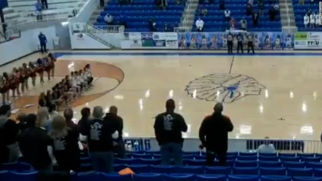 Announcer who hurled racist insults at a high school basketball team has issued an apology