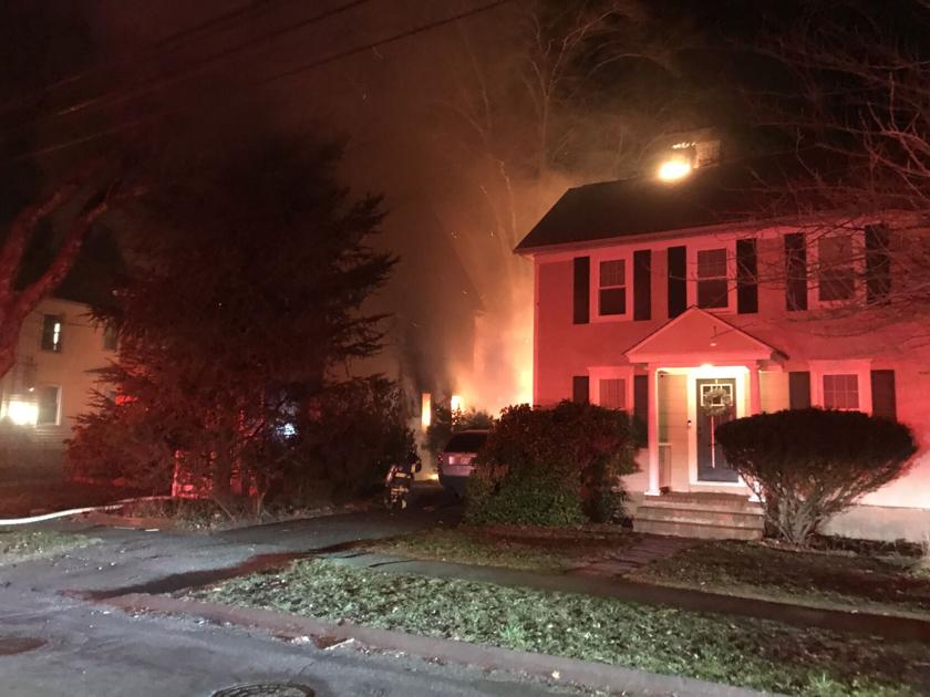 Fast-acting neighbors credited with saving residents from burning home