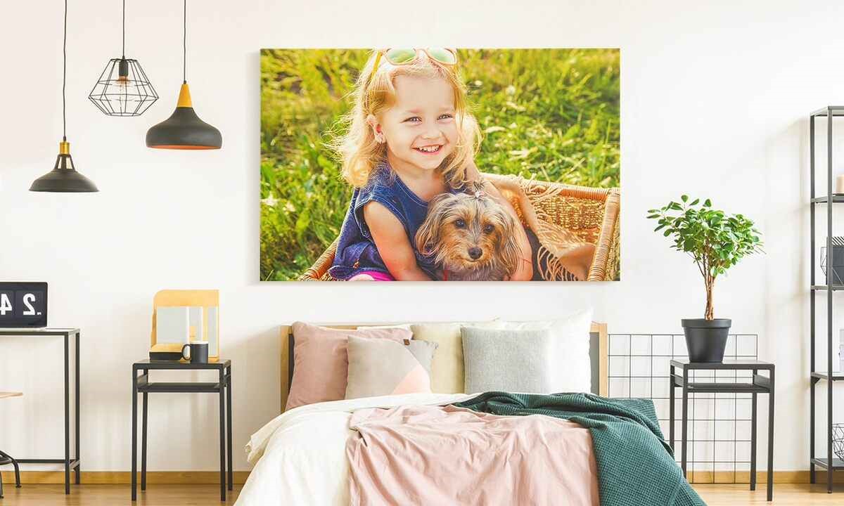 Canvas print of a little girl with dog